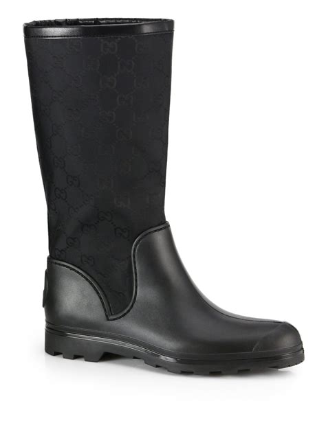 gucci black gg rubber flat rain boots|farfetch Gucci rain boots.